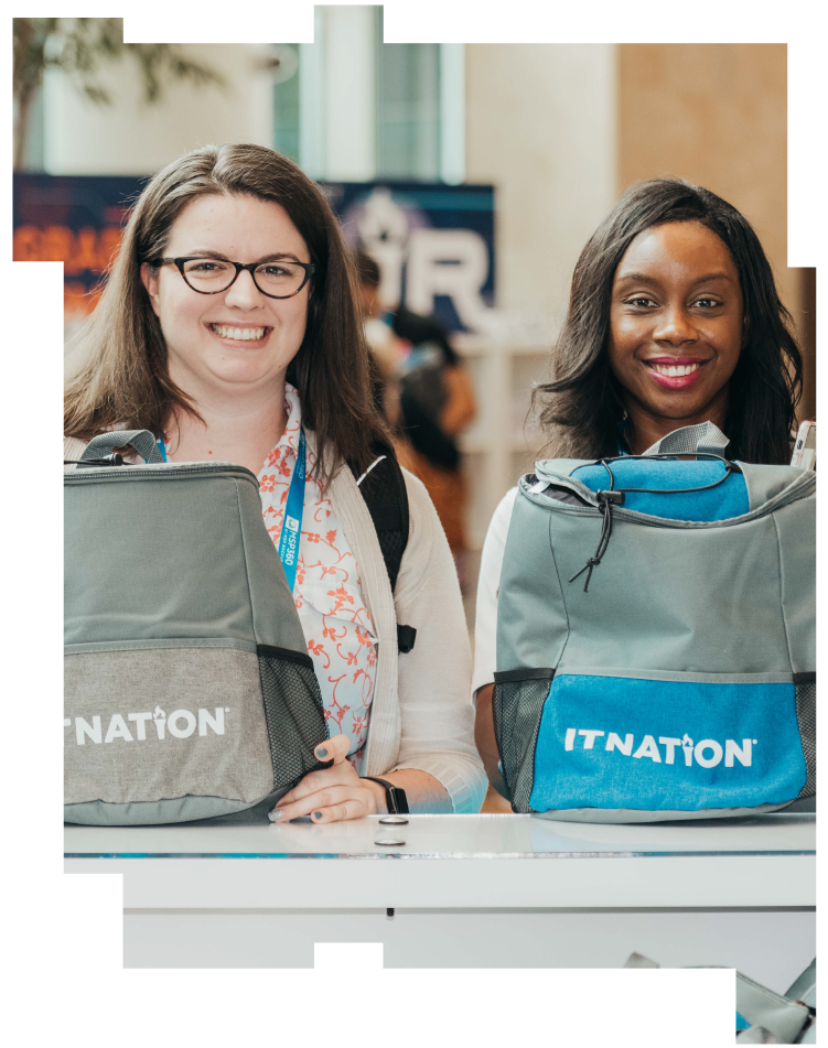 Two smiling women with ConnectWise IT Nation backpacks